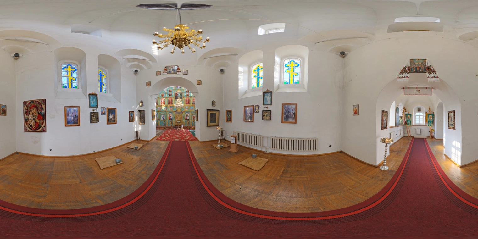 Free 16K unclipped HDRI of a small cathedral interior with soft, natural low-contrast daylight, warm wood floors, red carpet and gentle stained-glass highlights.