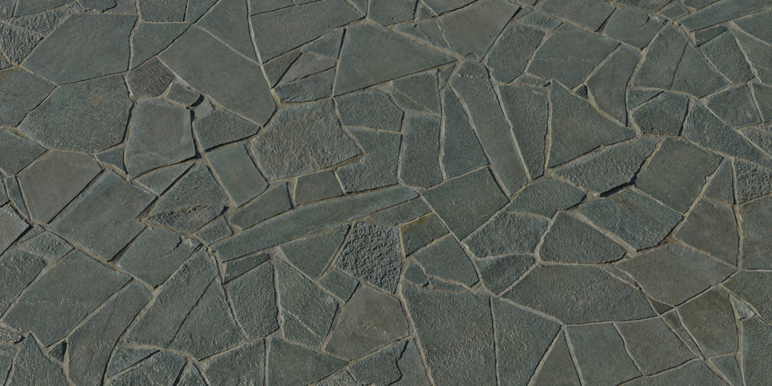 Free 8K texture of dark irregular stone tiles with subtle shine, smooth worn faces, uneven edges and narrow mortar joints, slightly reflective surface.