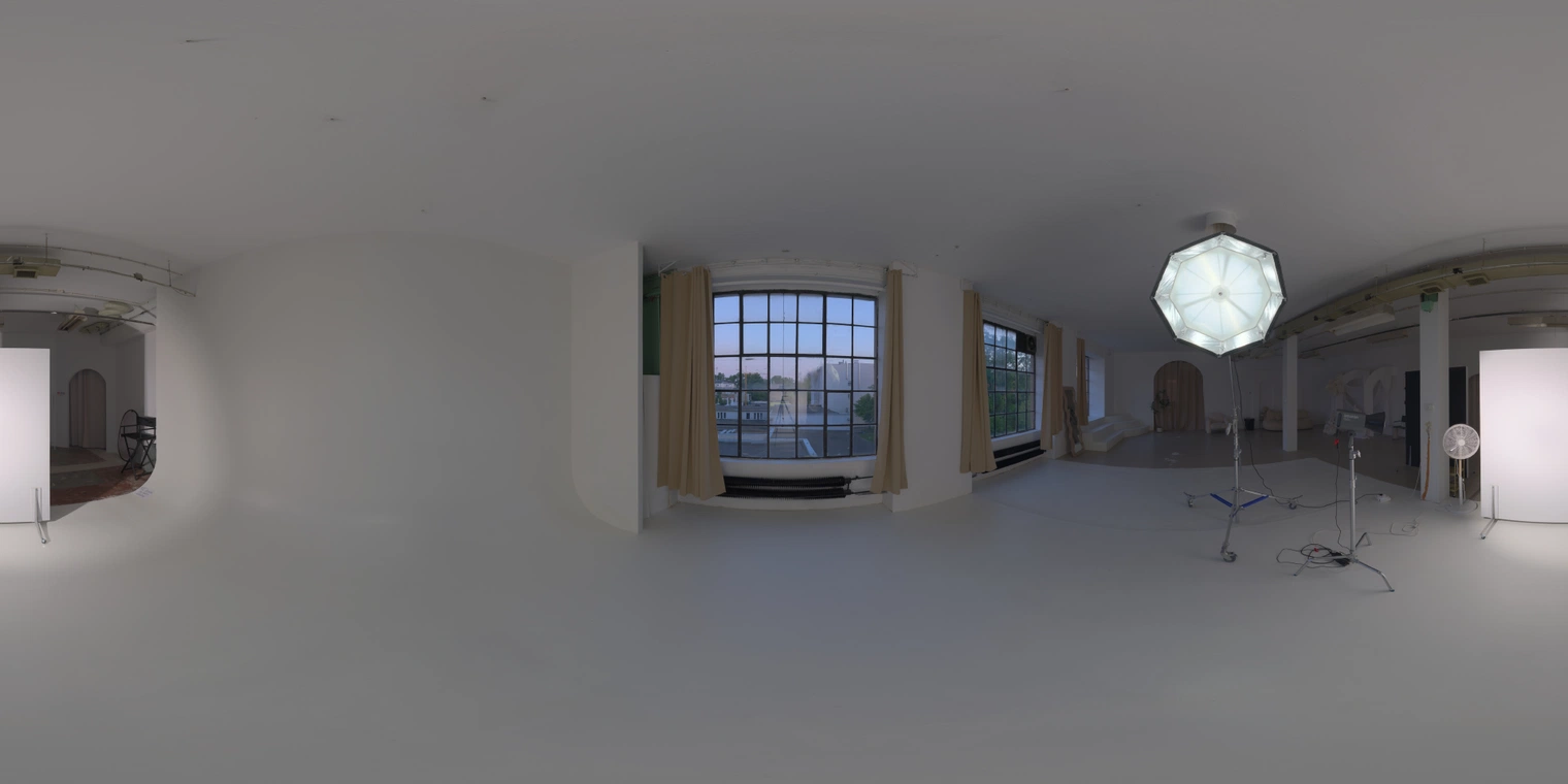 Free 20K unclipped HDRI - soft indoor studio with umbrella softbox, window & lamp; medium-contrast mixed light, for portraits & product renders.