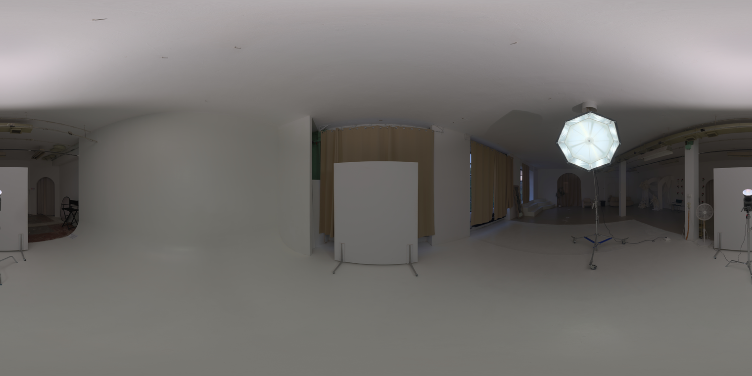 Free 20K unclipped HDRI: indoor studio with umbrella/softbox lamp, neutral walls and mid-contrast artificial light, great for portraits, products and lookdev.