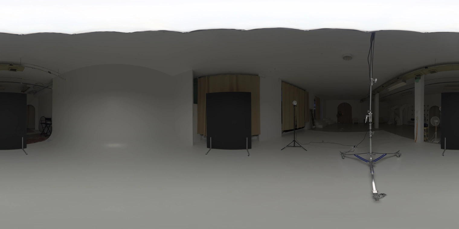 Free 20K HDRI, unclipped - white infinity studio with overhead umbrella/softbox and lamp; high-contrast artificial lighting for portraits and product shots.