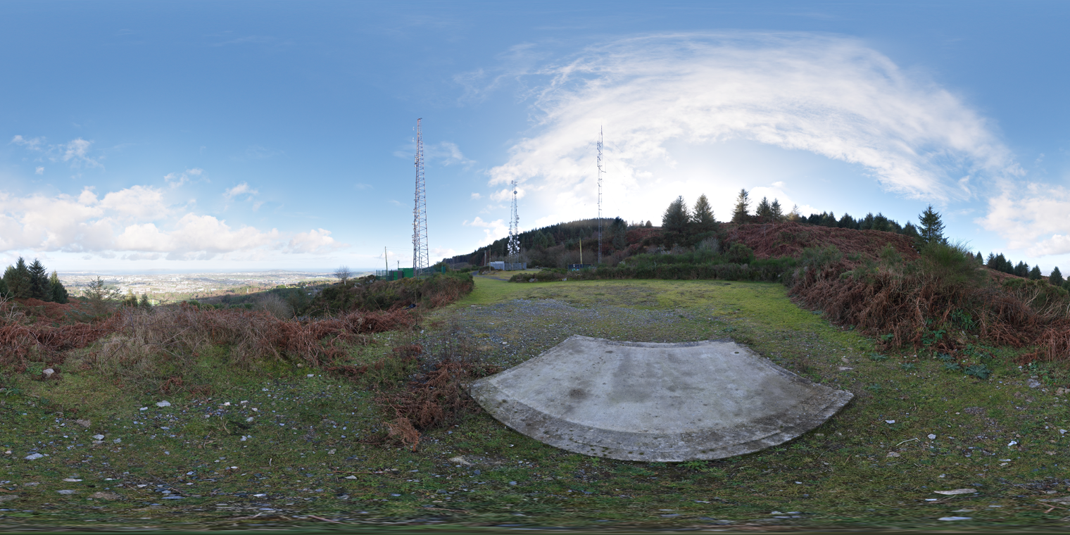 Free 20k unclipped HDRI - hilltop scene with clear blue sky, thin clouds and soft directional sunlight; cool, natural daylight mood with mild contrast.