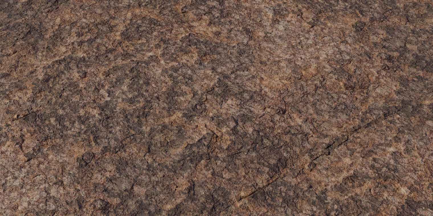 Free 16K texture of weathered Rock with a tiger stripe-like pattern - rugged, coarse rock surface with warm brown‑orange hues, dark mottling and rough, eroded detail.