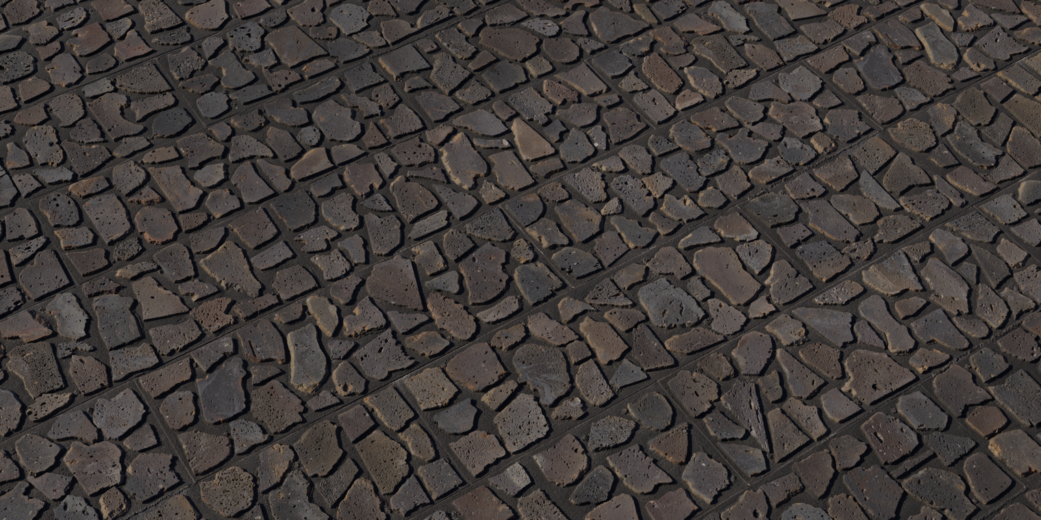 Free 8K texture of rough volcanic rock tiles: dark, irregular mosaic stones with pitted basalt surfaces, deep grout lines and subtle low-sheen highlights.