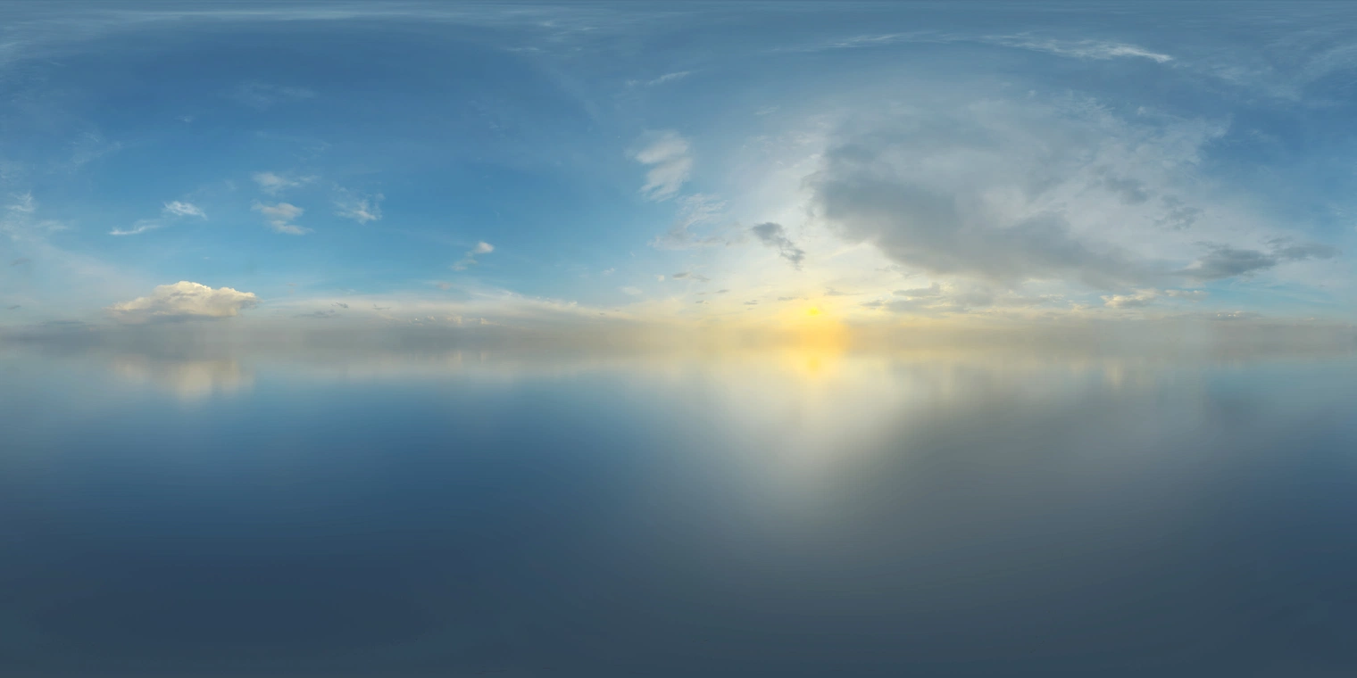 Free 16K unclipped HDRI - serene sunrise/sunset glow at the horizon, broad partly cloudy sky, medium contrast with soft warm light.