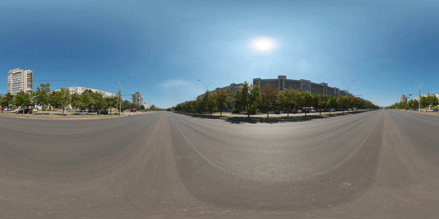 Free, unclipped 16K HDRI of a sunlit wide city avenue at midday - clear sky, strong directional sunlight, high contrast and neutral asphalt tones.
