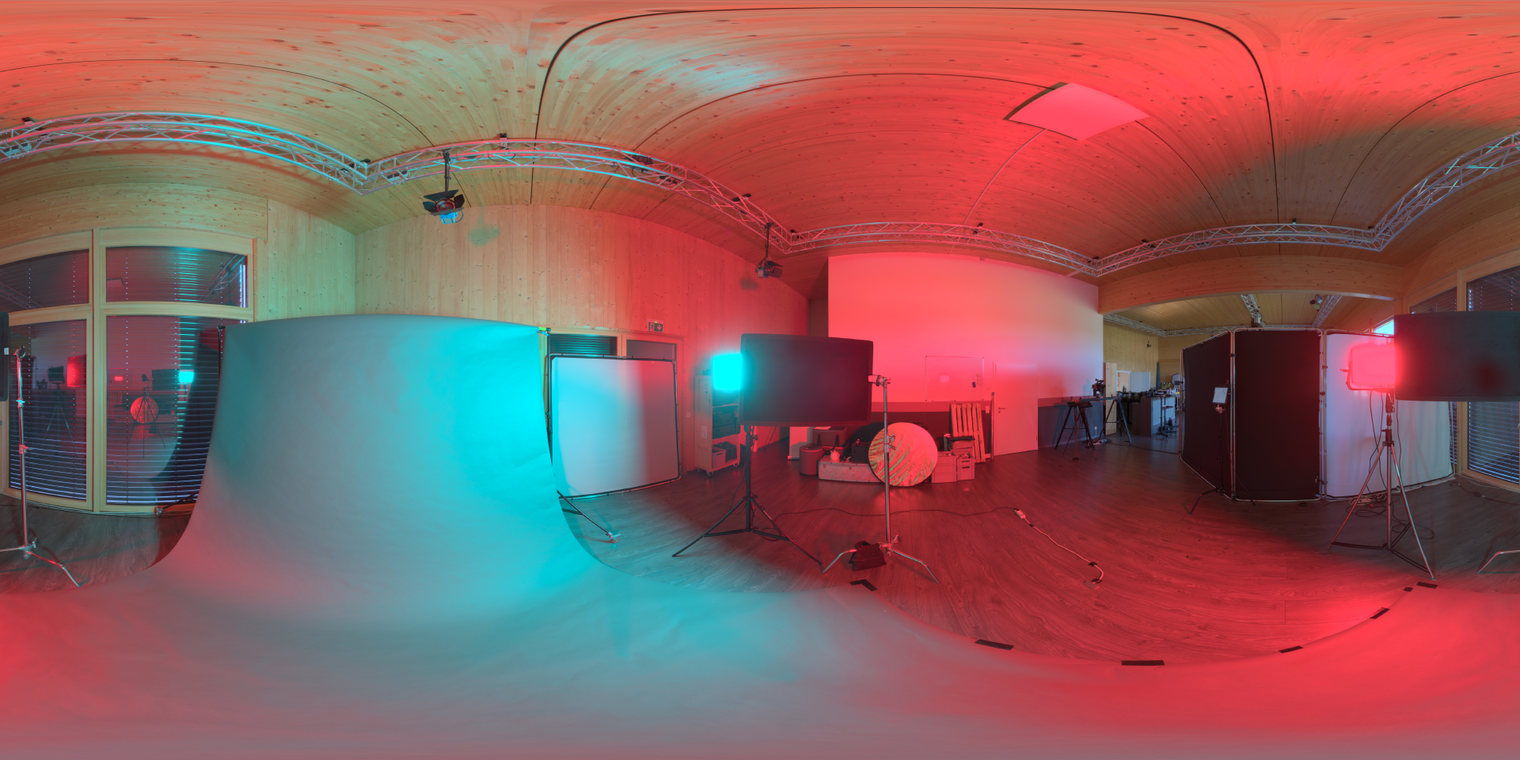 Free, unclipped 23K HDRI of a wooden-ceiling studio with black floor and LED panels - high-contrast red/teal/blue lighting, great for product/cinematic renders.