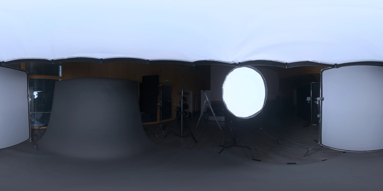 Free 24K HDRI, unclipped - soft studio lighting from a large white softbox and lamp over a black floor; medium contrast, great for product and portrait render