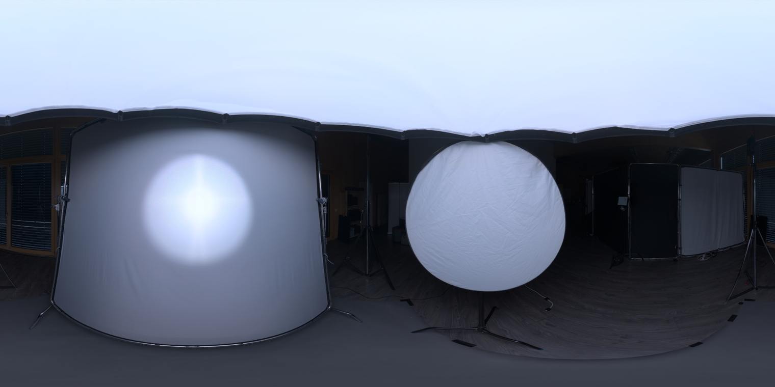 Free, unclipped 24K HDRI - soft studio indoor lighting with a large white softbox and lamp on a dark floor; low-medium contrast, ideal for product/portrait renders.