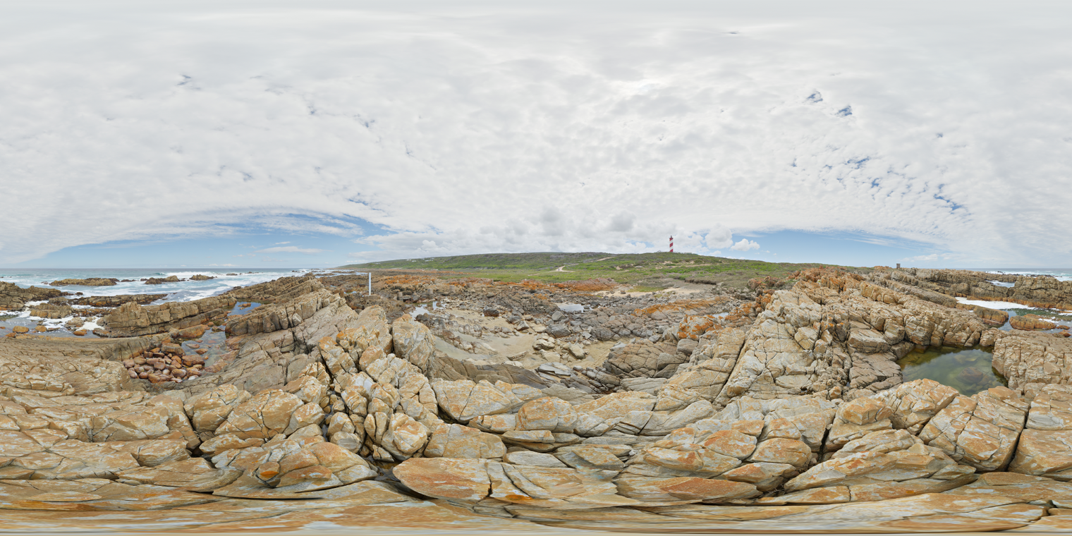Free 24K unclipped HDRI of a rocky coast, bright overcast sky, soft diffuse shadows, cool ocean sheen and detailed rocks.